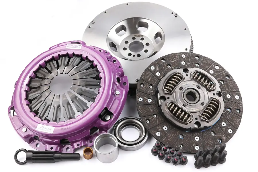 Nissan Z Sprung Organic Clutch Upgrade - 620 Nm Torque Capacity Nissan Z sprung organic clutch upgrade kit KNI25530-1A with pressure plate, flywheel, and organic friction disc for 620 Nm torque capacity